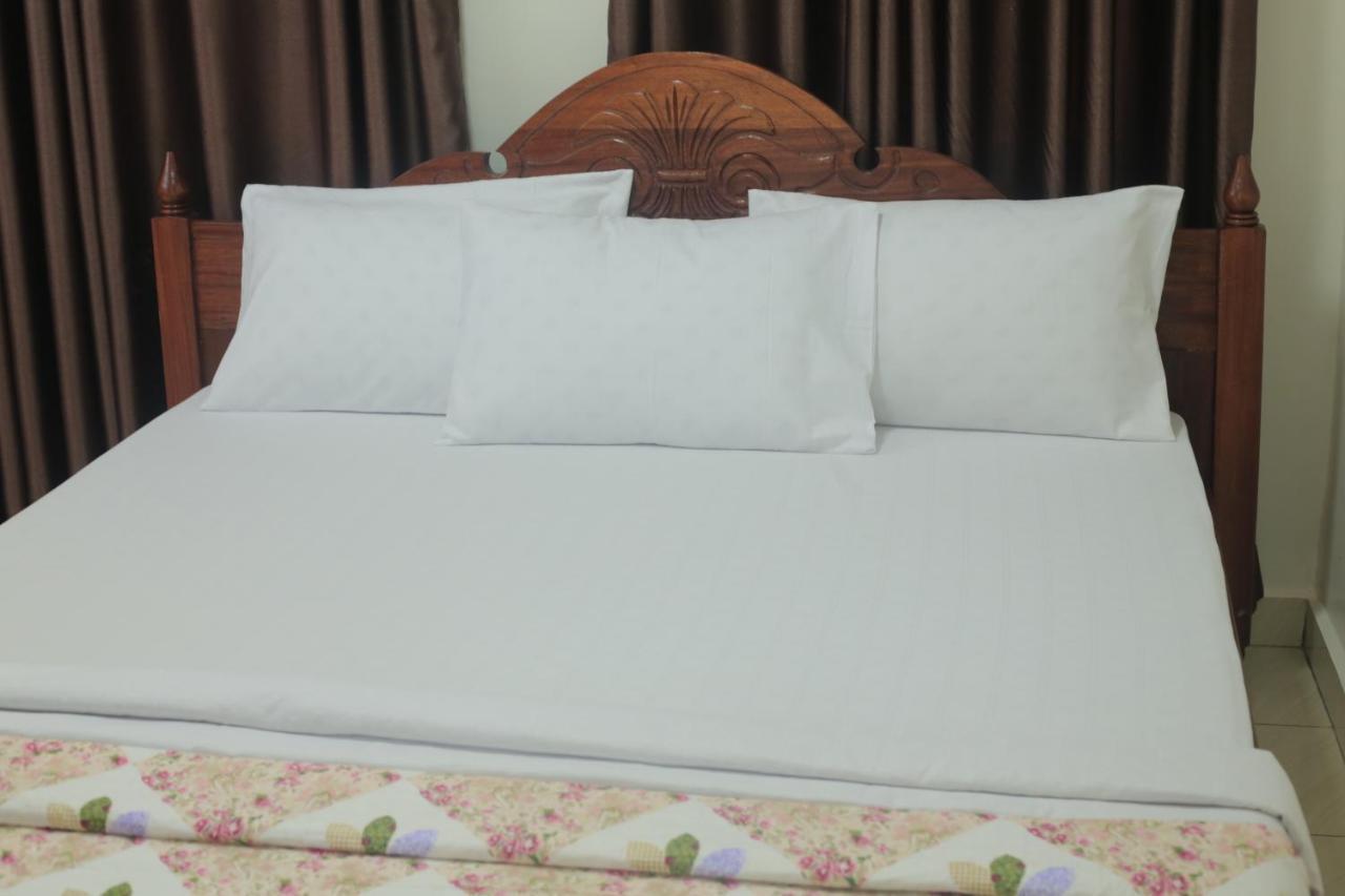 Corina K Guest House Кигали Экстерьер фото